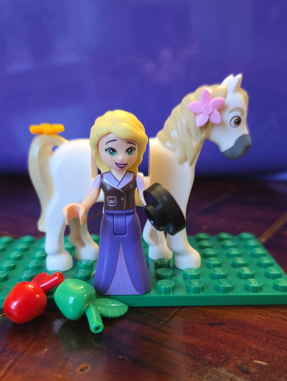 LEGO Rapunzel mini figure riding her horse, Maximus.